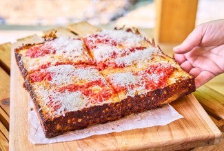Pizza Oven Detroit Pizza on a cutting board