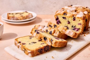 Blueberry Bread sliced on a cutting board