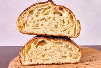 Croissant Sourdough Bread cut in half and stacked high