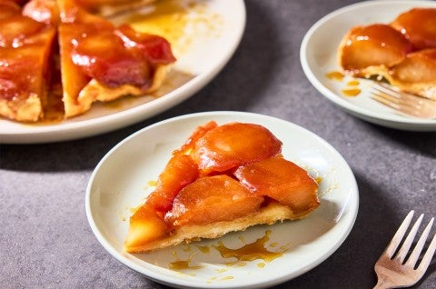 A slice of Classic Apple Tarte Tatin on a plate